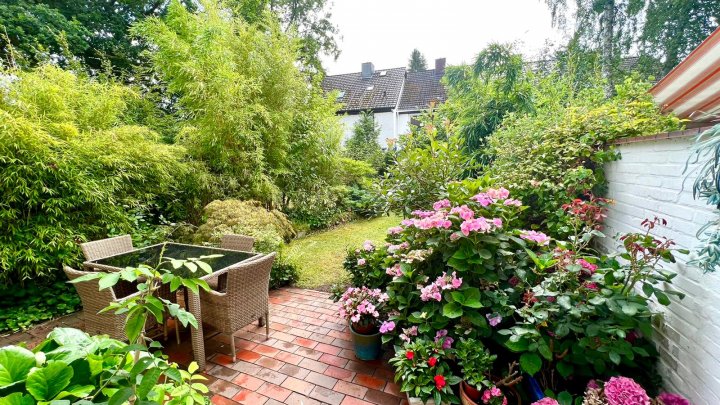 Gemütliches Nest für Familien - Modernisiertes Mittelreihenhaus mit sonnigem Südwest-Garten
